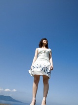 Saki Koto posing in her dress