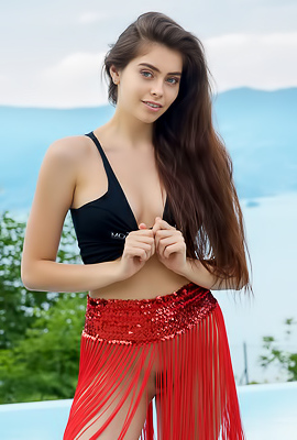 Foxy Alissa Letting The Long Red Fringes Of Her Skirt Fall Away To Expose Her Sexy Ass