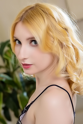 Minnie Lighter Squeezing Her Gorgeous Breasts And Smiles Seductively