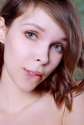 Kitty Gem Flaunts Her Allure With Daring Striptease In Stockings And Garter Belt