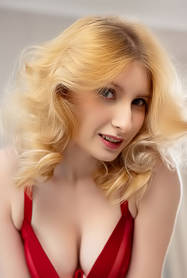 Minnie Lighter Teases On The Couch With Seductive Lingerie And Alluring Curves