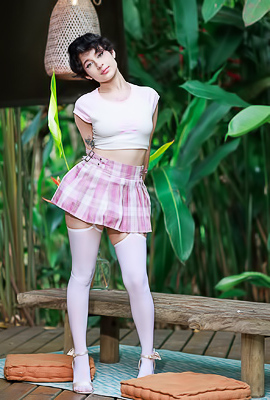 Dakota Jhons Entices In White Top And Plaid Skirt Outdoors Posing Seductively With High Heels On