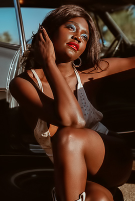 Victoria Antoinettes Lustrous Breathless Gaze Against The Hills And Vintage Car